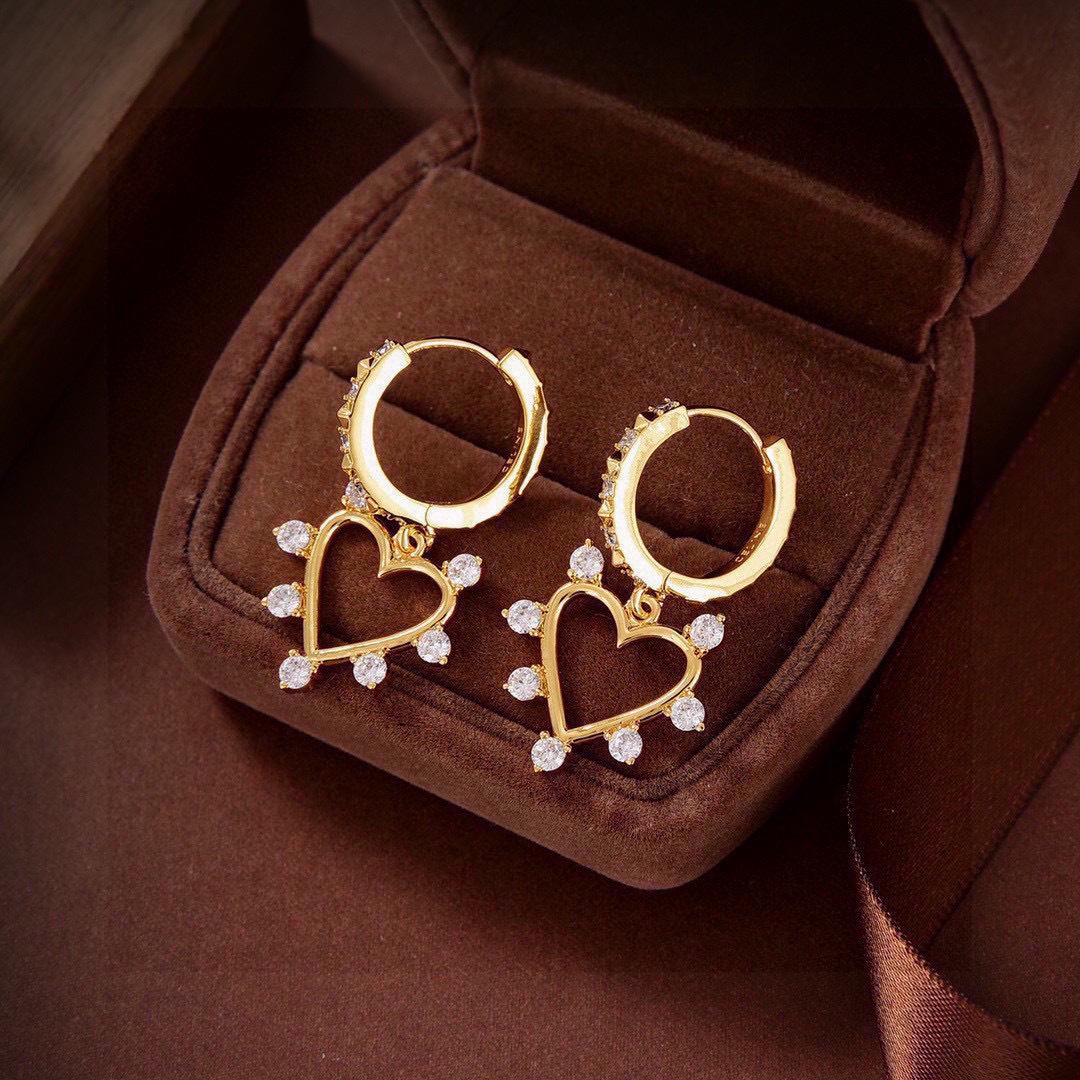 Celine Crystal Heart Hoop Earrings earrings gold-tone metal with clear crystal accents 1 5cm drop length