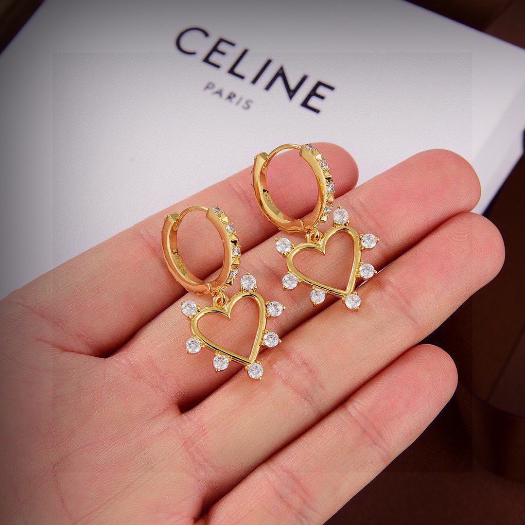 Celine Crystal Heart Hoop Earrings earrings gold-tone metal with clear crystal accents 1 5cm drop length