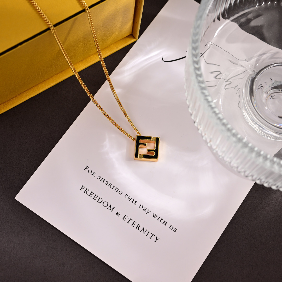 Fendi FF Logo Pendant necklace Gold-tone metal with black enamel inlay 45cm with 5cm extender