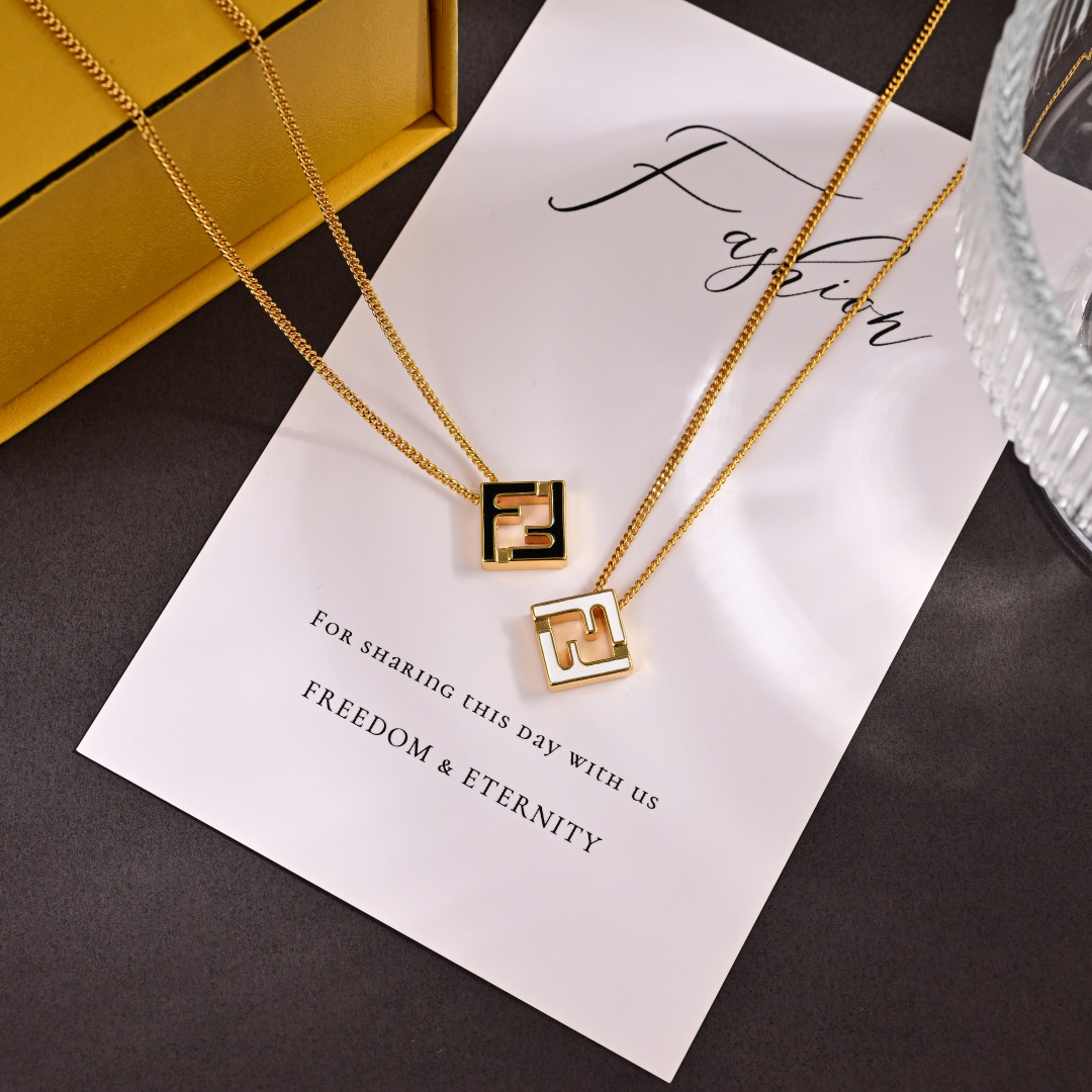 Fendi FF Logo Pendant necklace Gold-tone metal with black enamel inlay 45cm with 5cm extender
