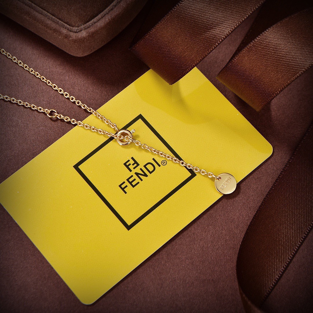 Fendi Baguette Bag Pendant Necklace necklace gold-tone metal with white pearl accents 45cm with 5cm extender