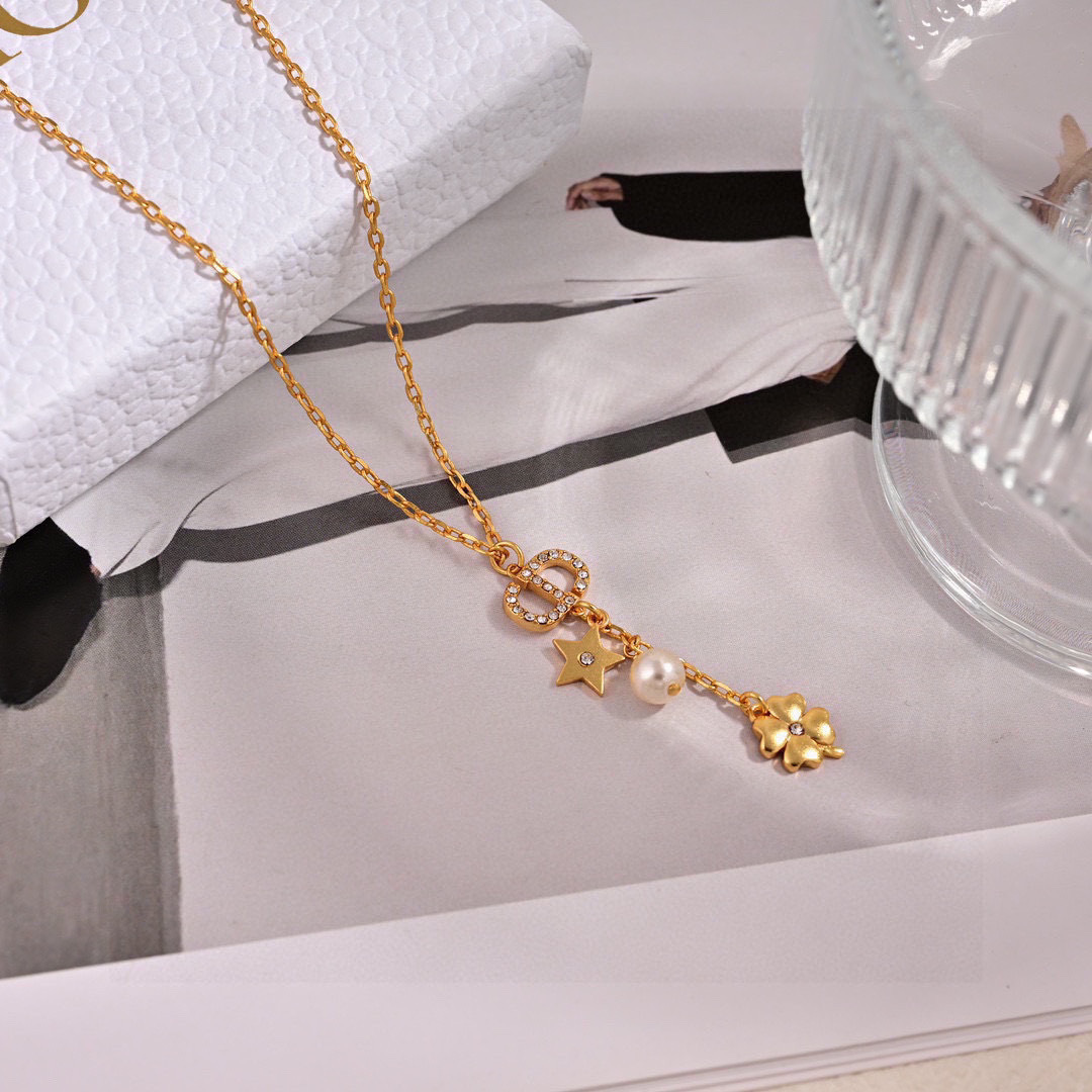 Dior Petit CD Lucky Charms necklace gold-tone metal with clear crystals white faux pearl 42cm with 5cm extender