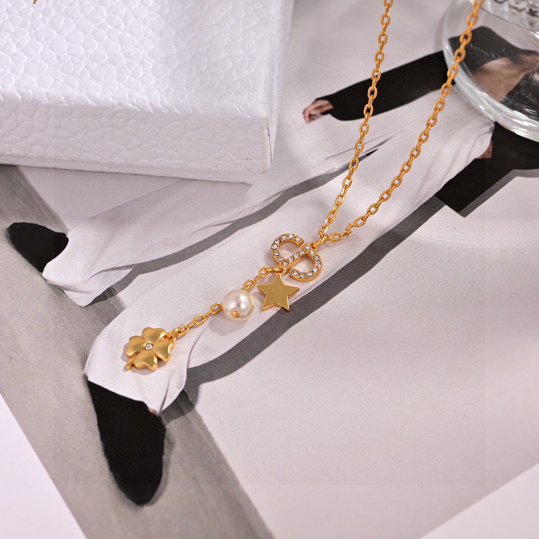 Dior Petit CD Lucky Charms necklace gold-tone metal with clear crystals white faux pearl 42cm with 5cm extender