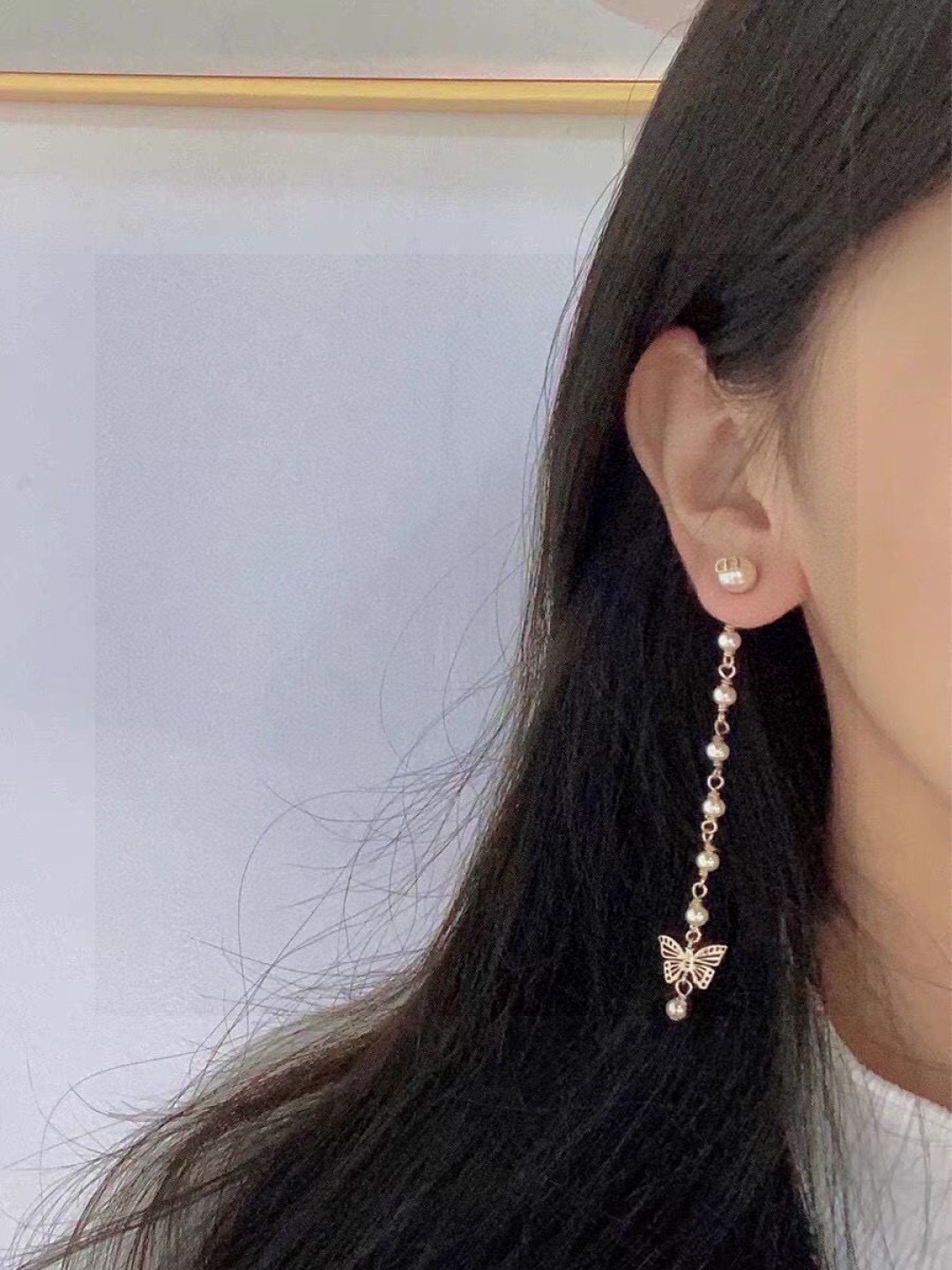 Dior CD Butterfly Pearl Long Drop earrings Gold-tone metal with white pearls Approximately 8cm drop length