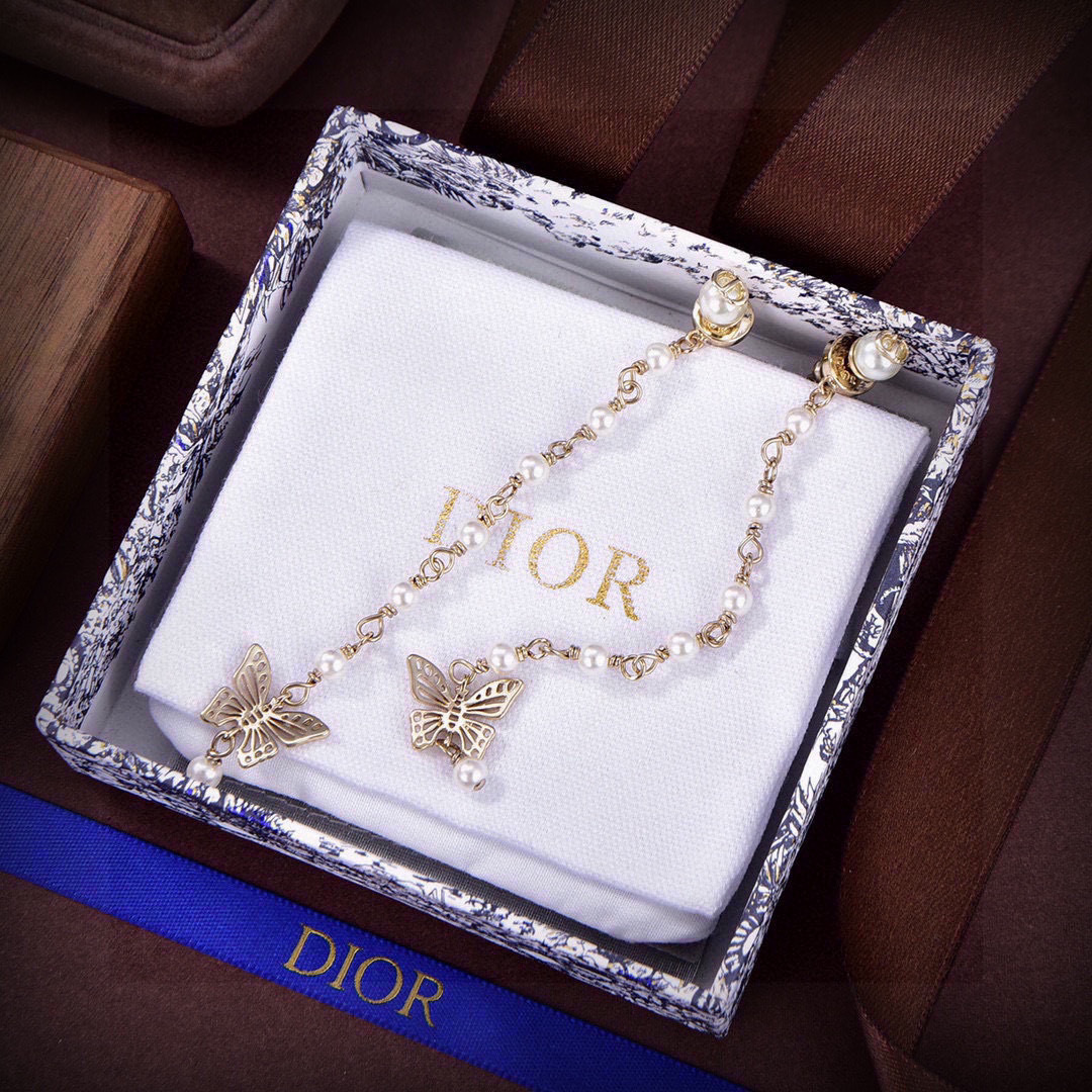 Dior CD Butterfly Pearl Long Drop earrings Gold-tone metal with white pearls Approximately 8cm drop length