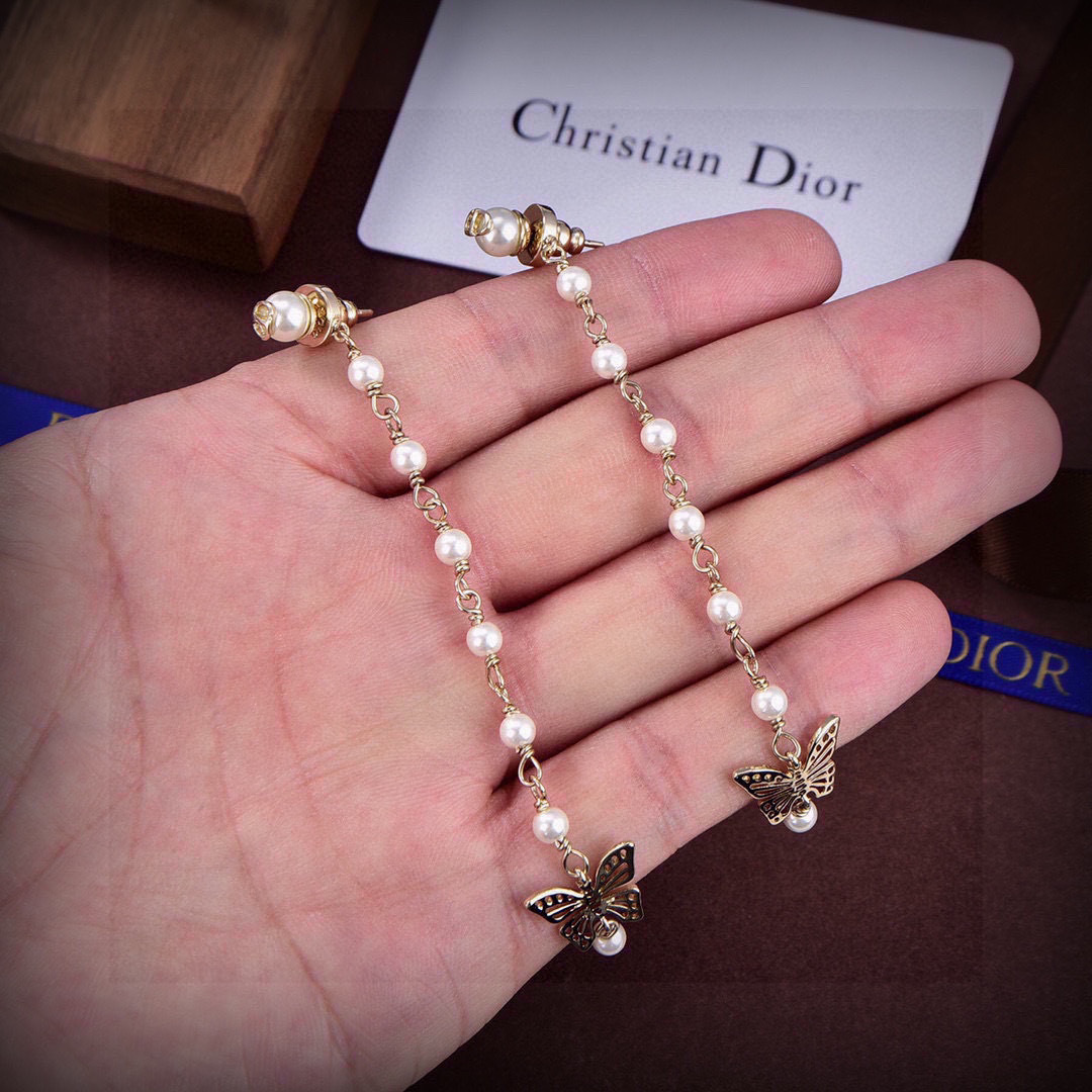 Dior CD Butterfly Pearl Long Drop earrings Gold-tone metal with white pearls Approximately 8cm drop length