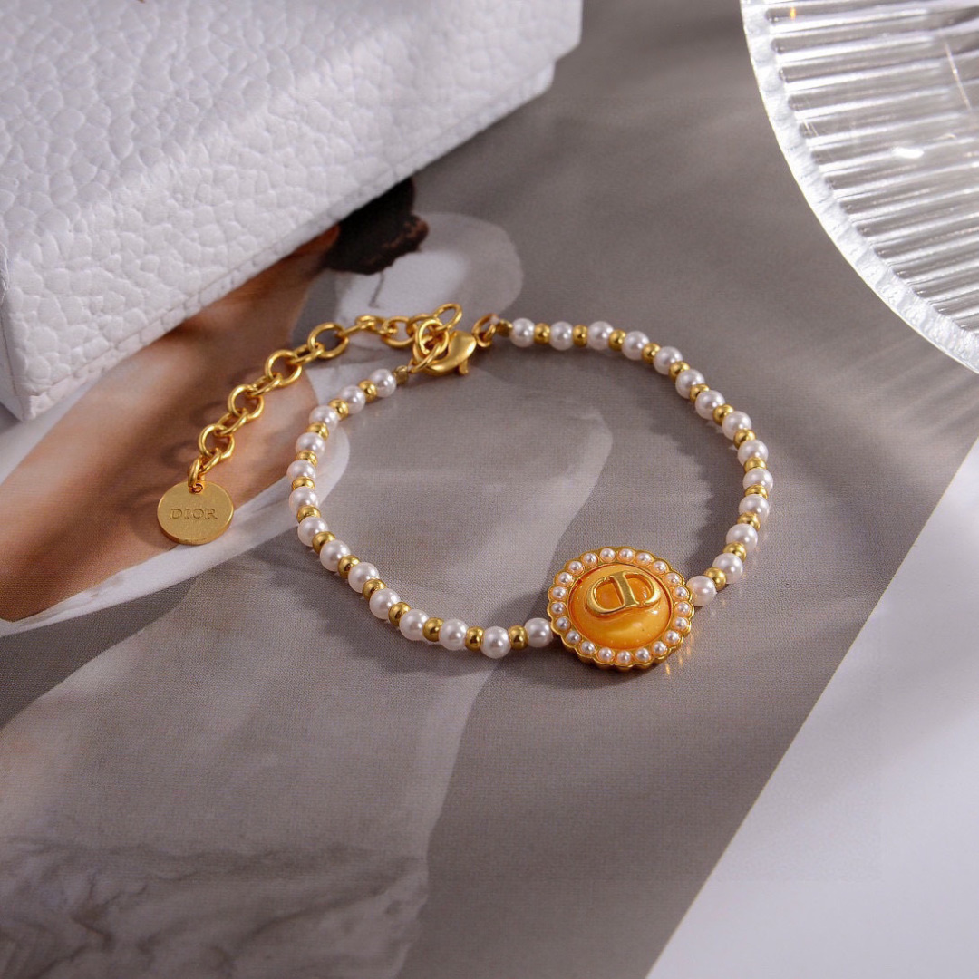 Dior Petit CD Pearl Bracelet bracelet Gold-tone metal with white resin pearls and black enamel CD medallion 16cm with 3cm extender chain