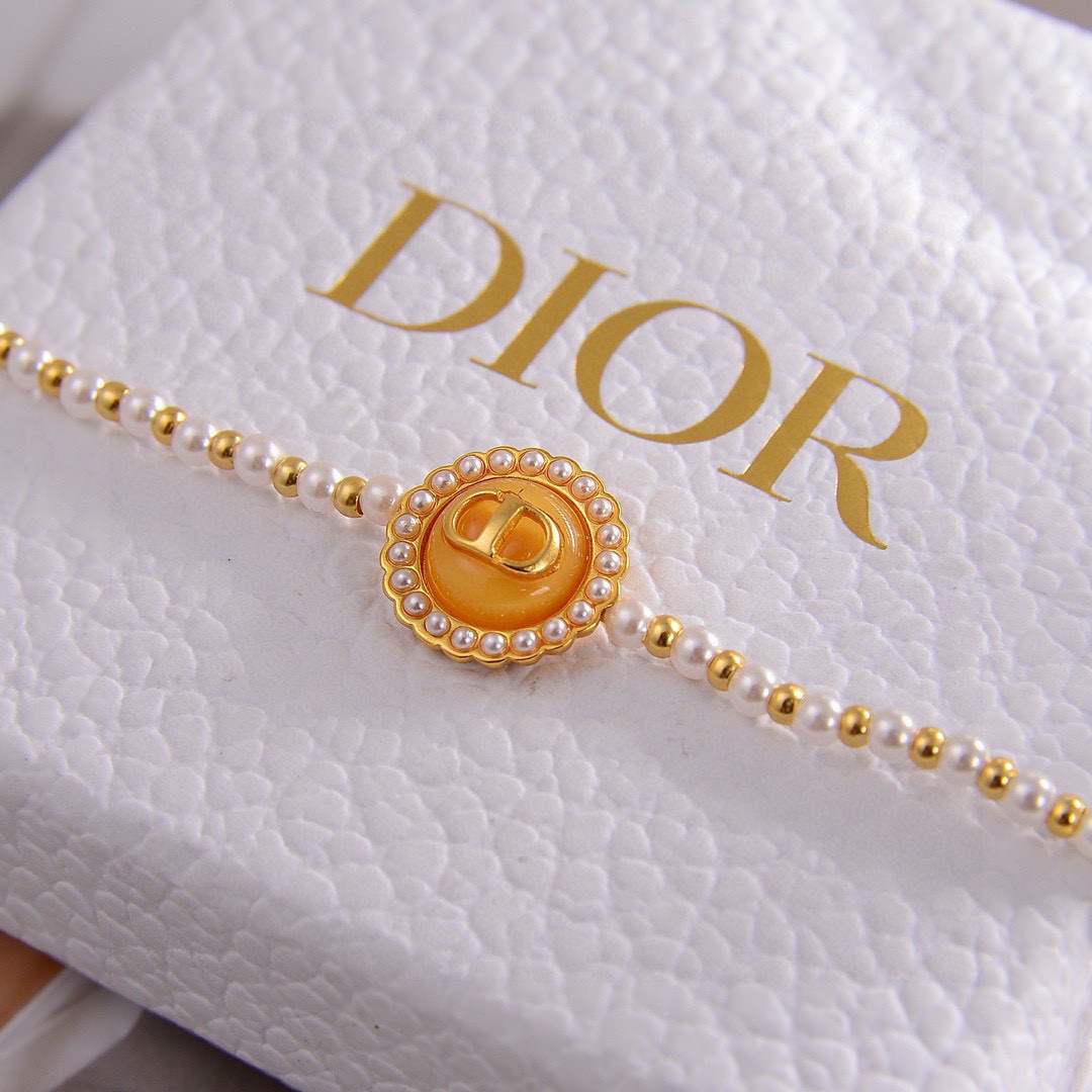 Dior Petit CD Pearl Bracelet bracelet Gold-tone metal with white resin pearls and black enamel CD medallion 16cm with 3cm extender chain