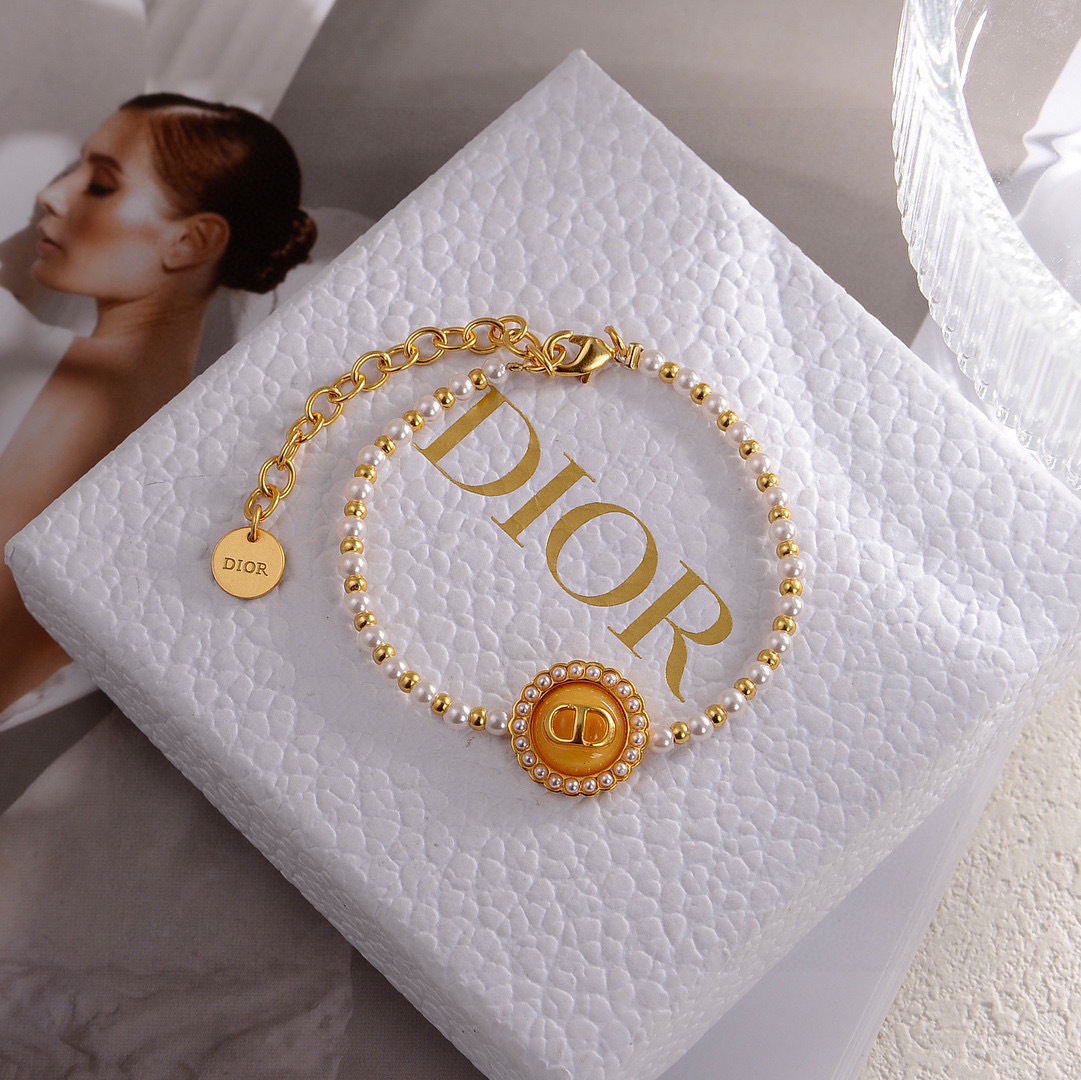 Dior Petit CD Pearl Bracelet bracelet Gold-tone metal with white resin pearls and black enamel CD medallion 16cm with 3cm extender chain