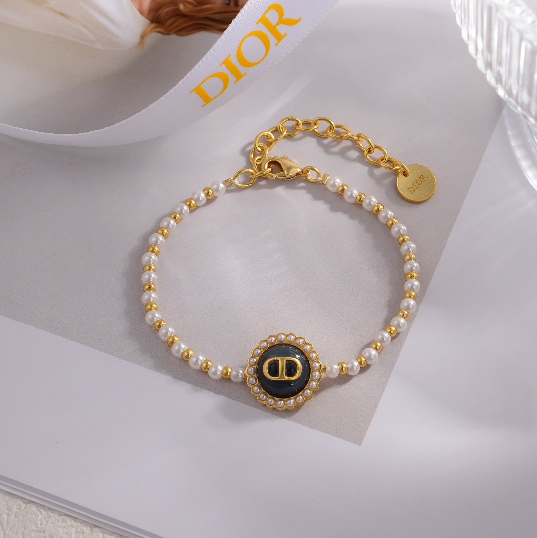 Dior Petit CD Pearl Bracelet bracelet Gold-tone metal with white resin pearls and black enamel CD medallion 16cm with 3cm extender chain