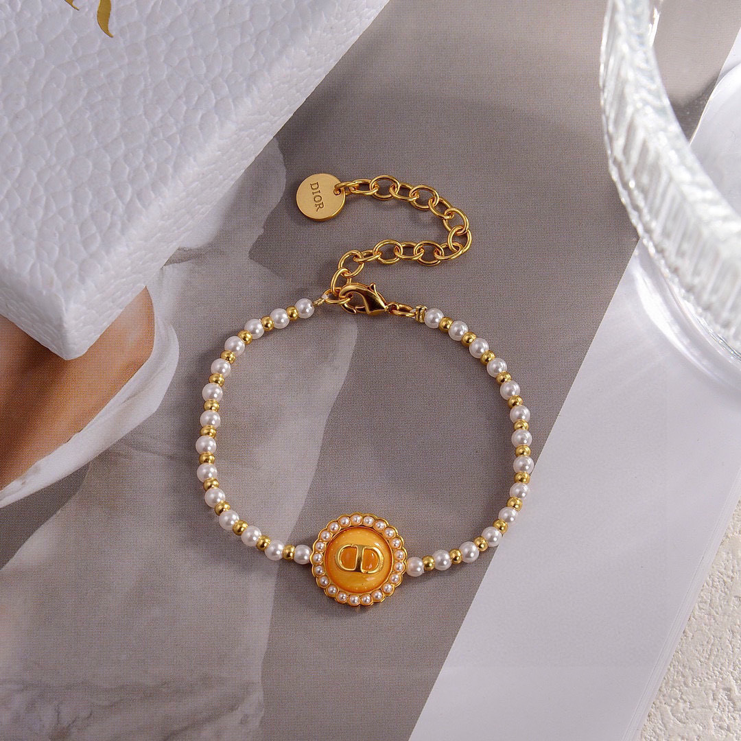 Dior Petit CD Pearl Bracelet bracelet Gold-tone metal with white resin pearls and black enamel CD medallion 16cm with 3cm extender chain