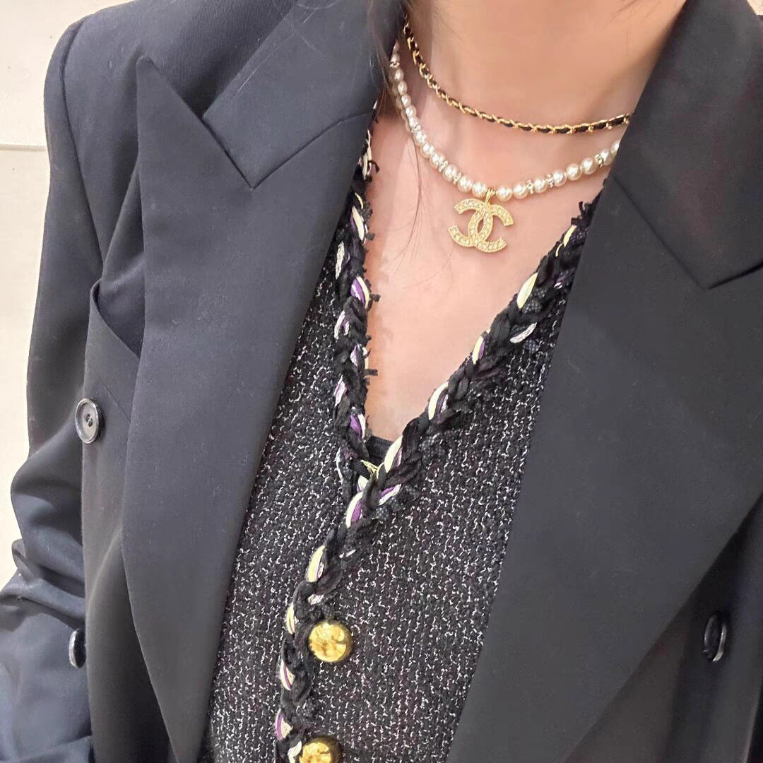 Chanel CC Logo Layered Pearl Leather Chain Necklace necklace Gold-tone metal white faux pearl black leather clear crystal 42cm