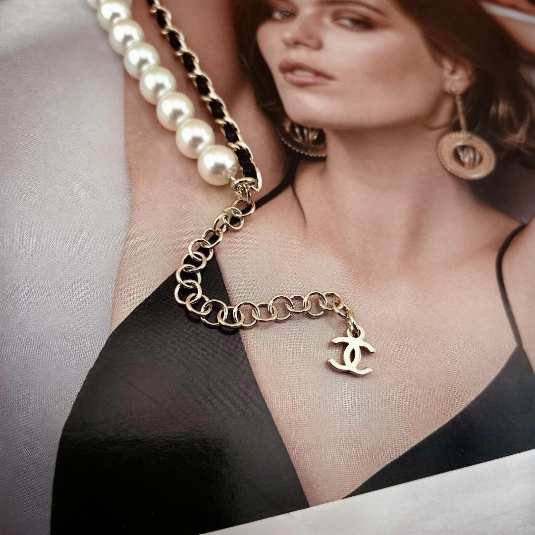 Chanel CC Logo Layered Pearl Leather Chain Necklace necklace Gold-tone metal white faux pearl black leather clear crystal 42cm