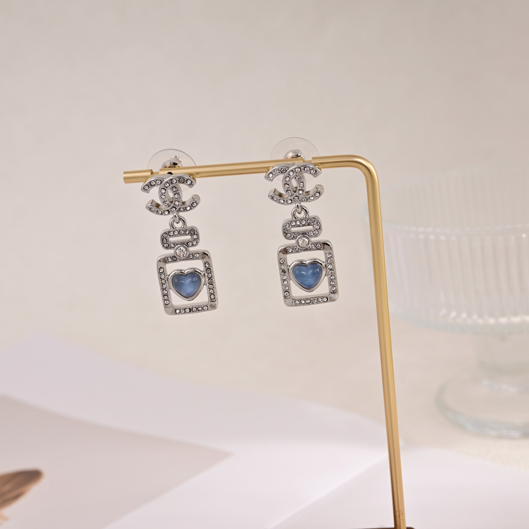 Chanel CC Logo Perfume Bottle Heart Drop Earrings earrings silver-toned metal clear crystal accents blue heart cabochon 3 2cm drop length