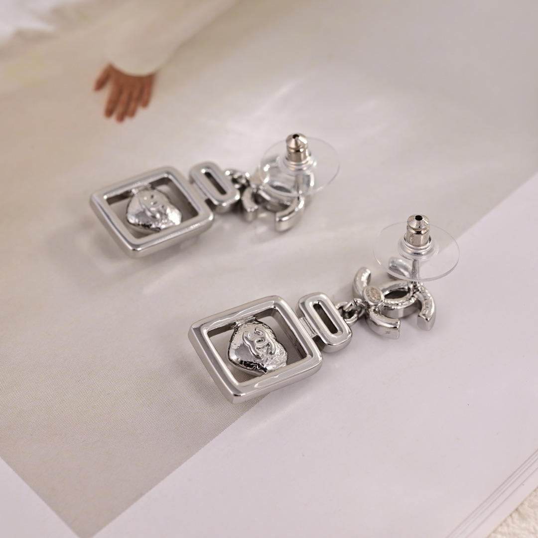 Chanel CC Logo Perfume Bottle Heart Drop Earrings earrings silver-toned metal clear crystal accents blue heart cabochon 3 2cm drop length