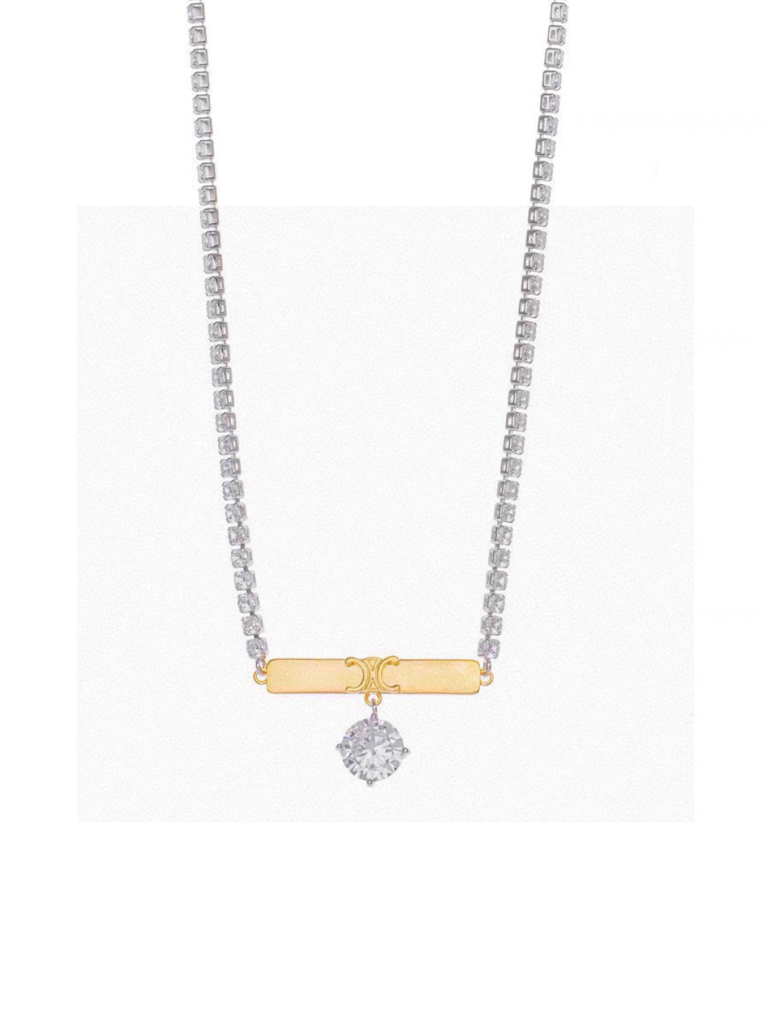Celine Triomphe Crystal Bar Pendant necklace Two-tone silver-toned metal with gold-tone Triomphe bar clear crystal accents 40cm with 5cm extender