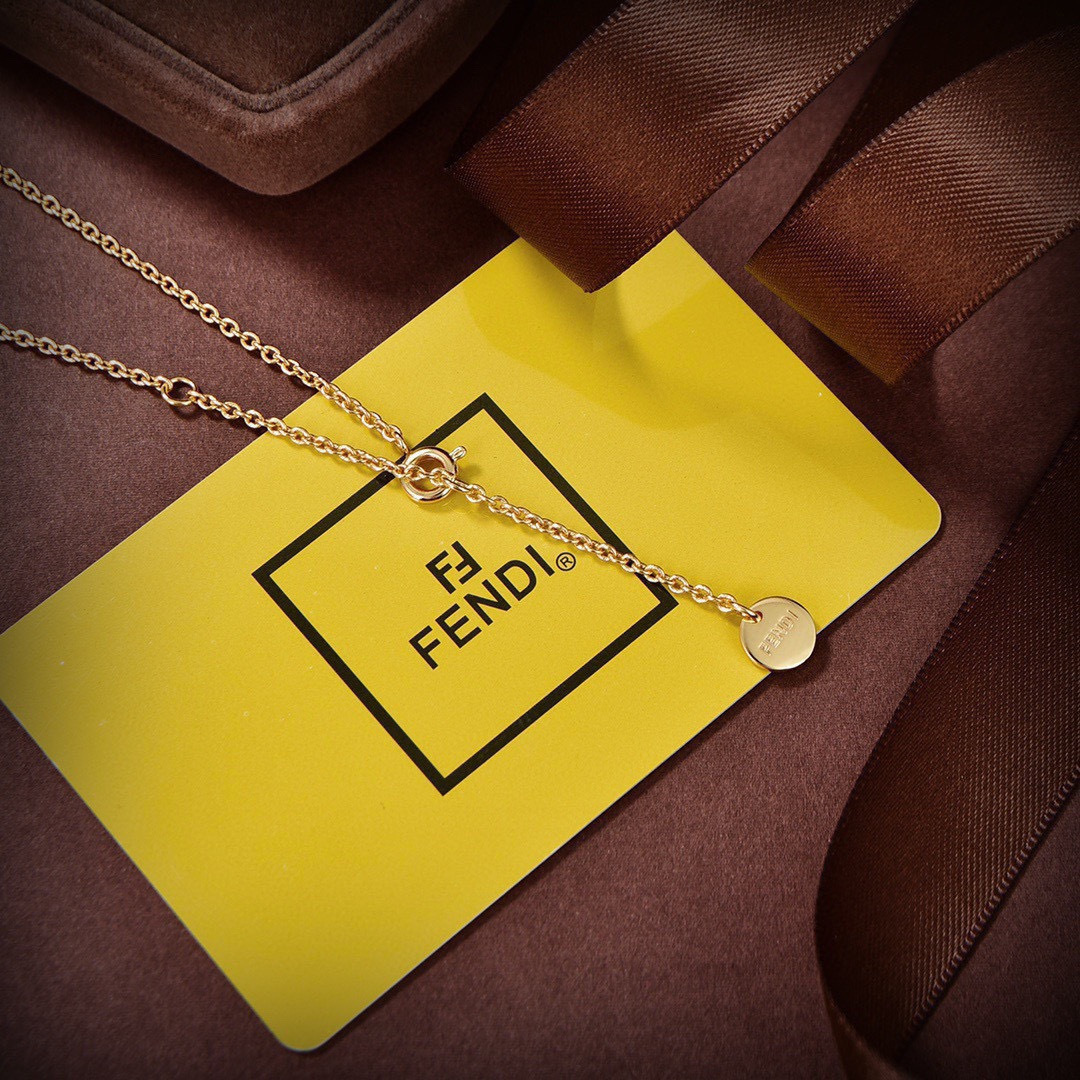 Fendi Baguette Bag Pendant necklace gold-tone metal with white pearl accents 45cm