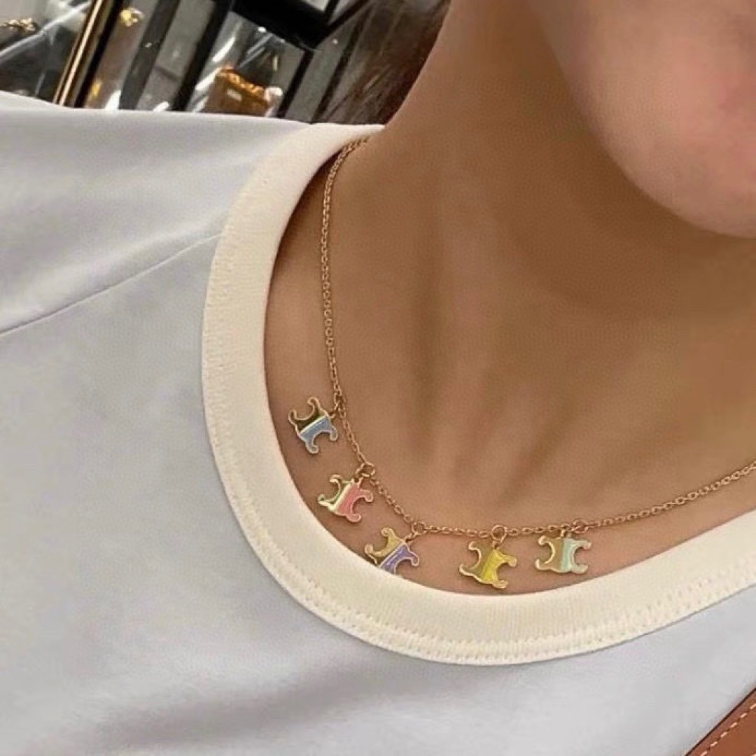 Celine Triomphe Multi-Color Enamel Charm necklace Gold-tone metal with turquoise yellow purple pink enamel accents 42cm