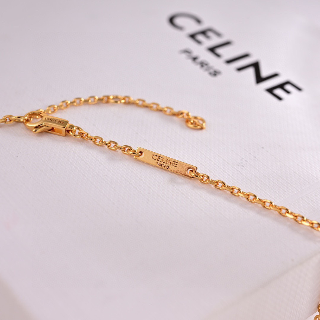 Celine Triomphe Multi-Color Enamel Charm necklace Gold-tone metal with turquoise yellow purple pink enamel accents 42cm