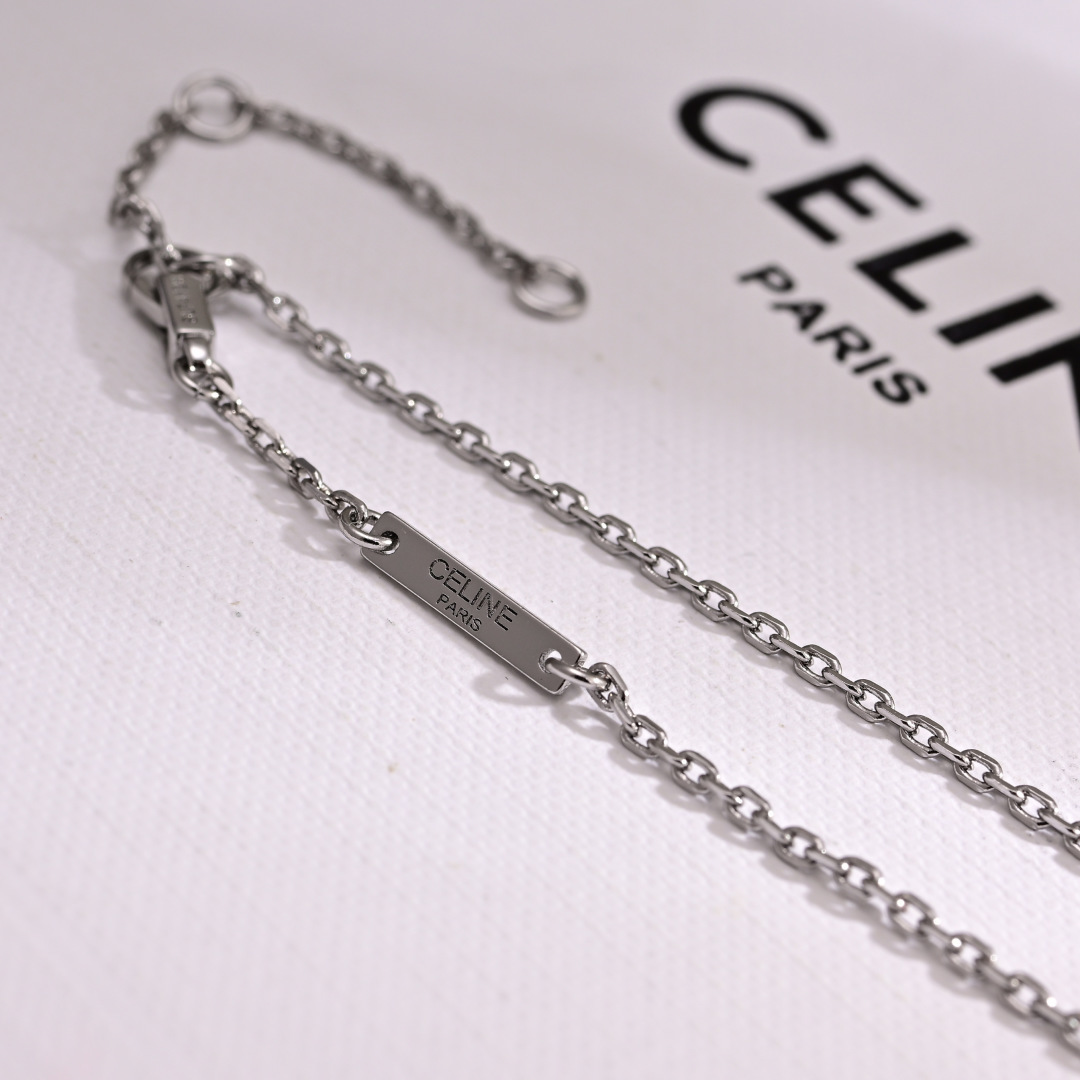 Celine Triomphe Nightfall necklace gold-tone brass with clear crystal accents 45cm with 5cm extender