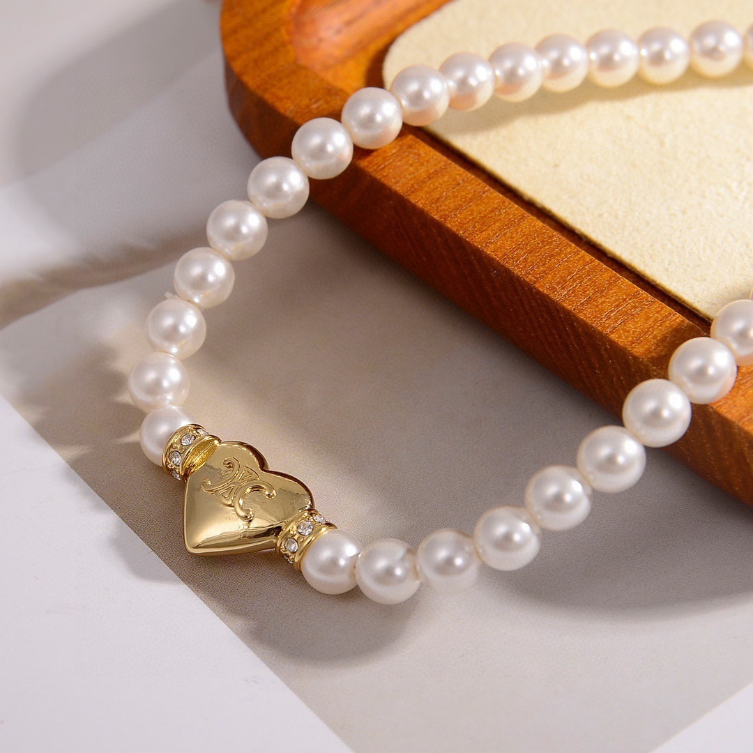 Celine Precious Heart Pearl necklace gold-tone metal white pearl clear crystal accents 40cm with 5cm extender chain