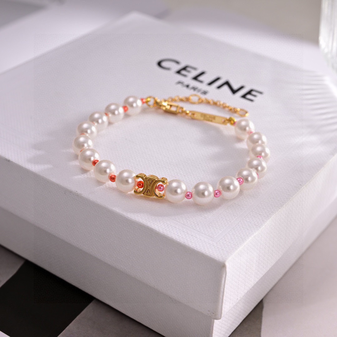 Celine Triomphe Precious Pearl bracelet gold-tone metal white pearl pink and coral accent beads 18cm with 5cm extender chain