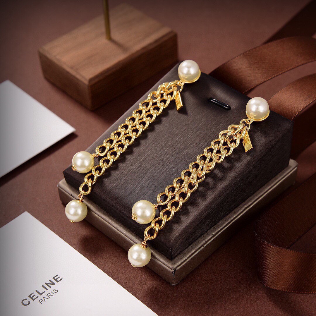 Celine Pearl Chain Drop Earrings earrings gold-tone metal with white pearl accents 7cm drop length