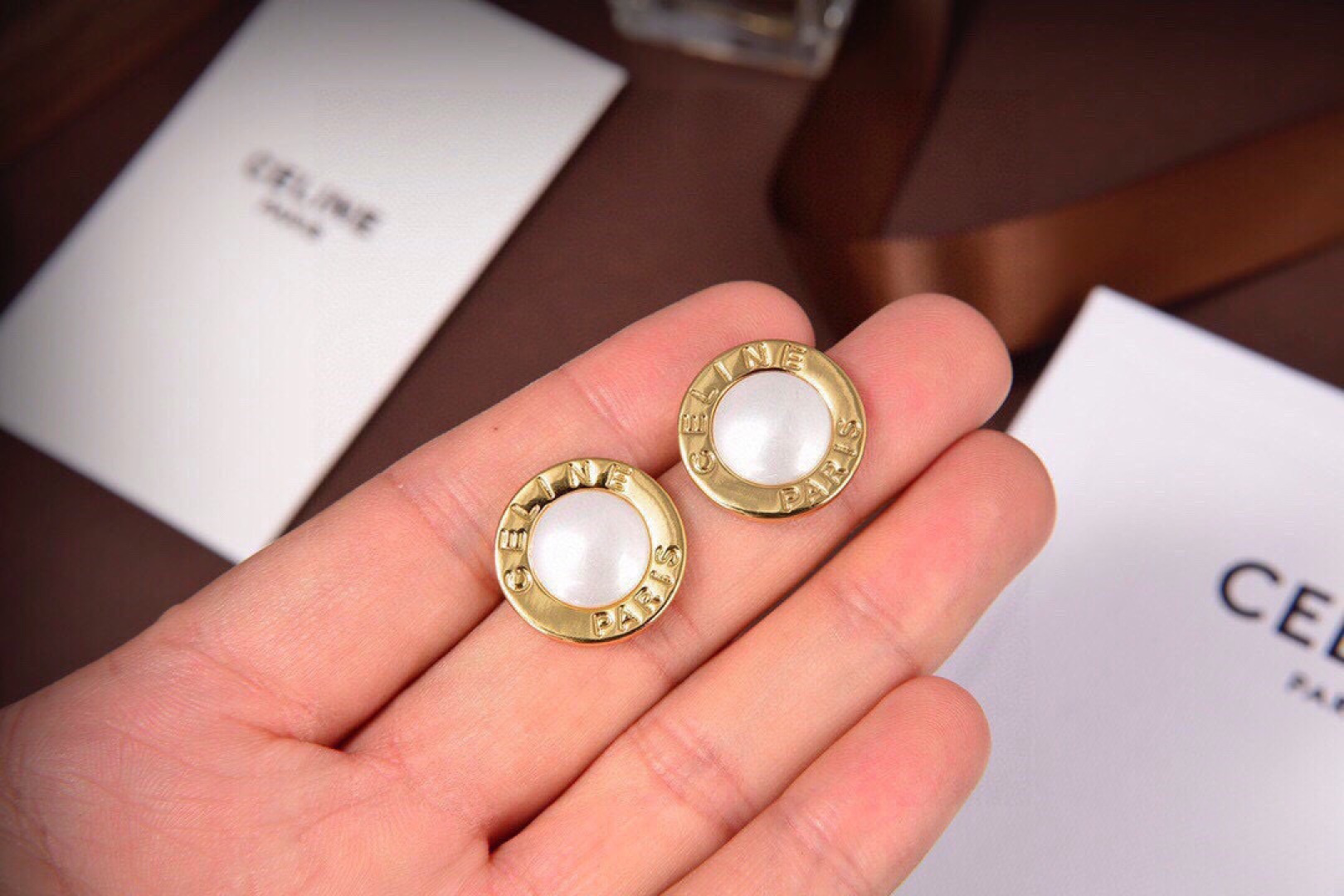 Celine Paris Logo Pearl Stud Earrings earrings gold-tone metal with white pearl center 1 5cm diameter