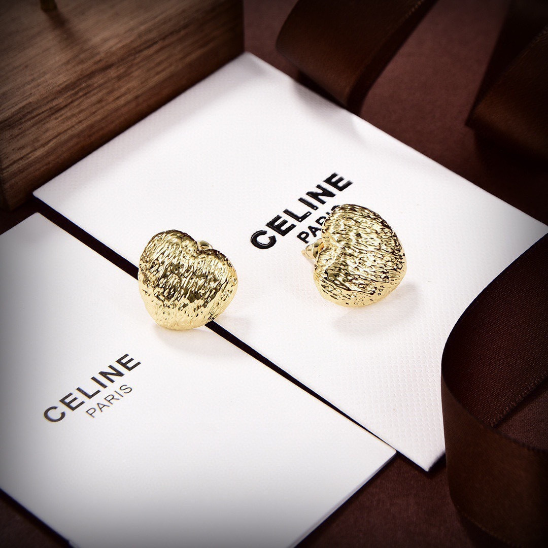 Celine Textured Puffy Heart Stud Earrings earrings Gold-tone metal with textured hammered finish no accent stones 1 5cm stud diameter