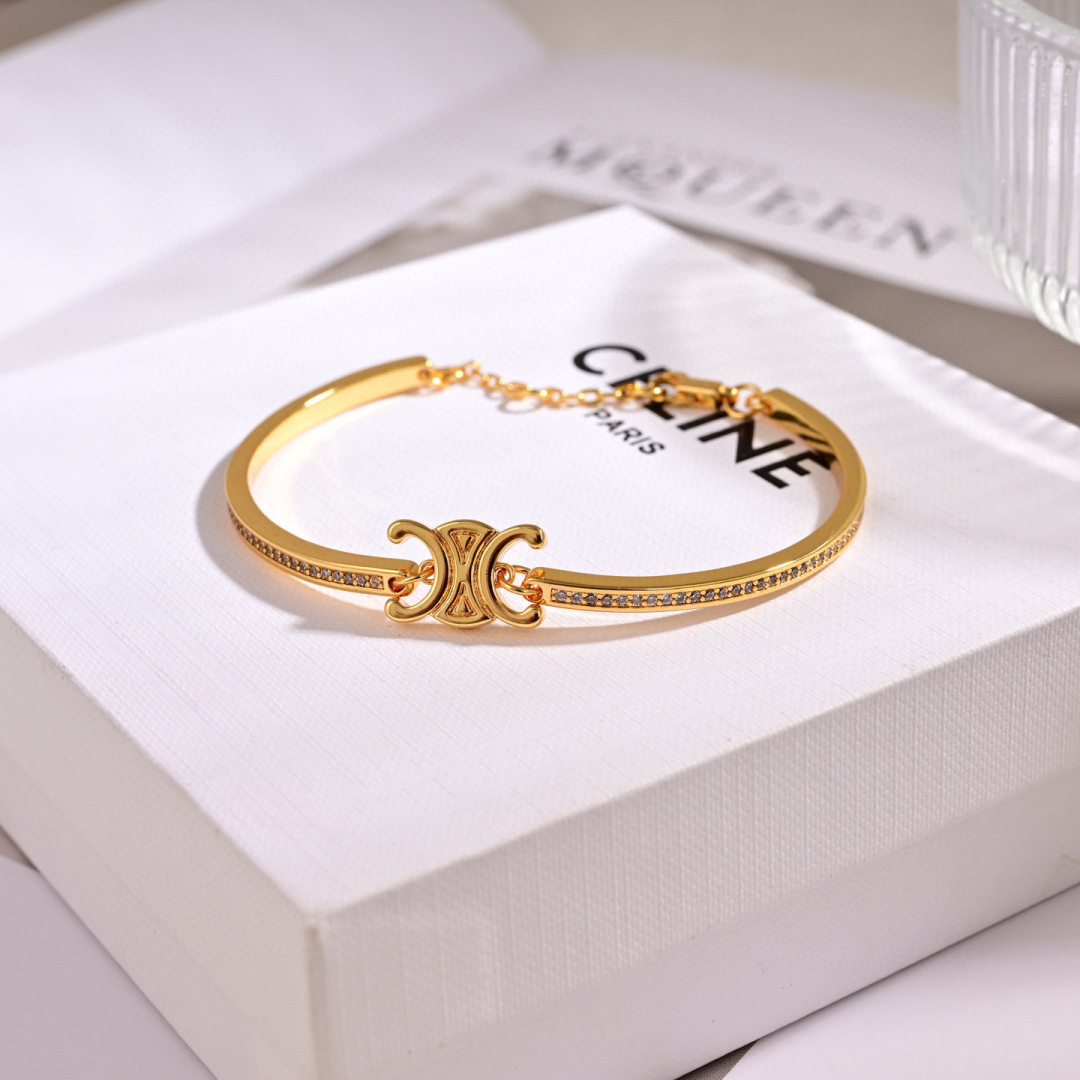 Celine Triomphe Sparkle bracelet gold-tone brass with clear crystal accents adjustable chain
