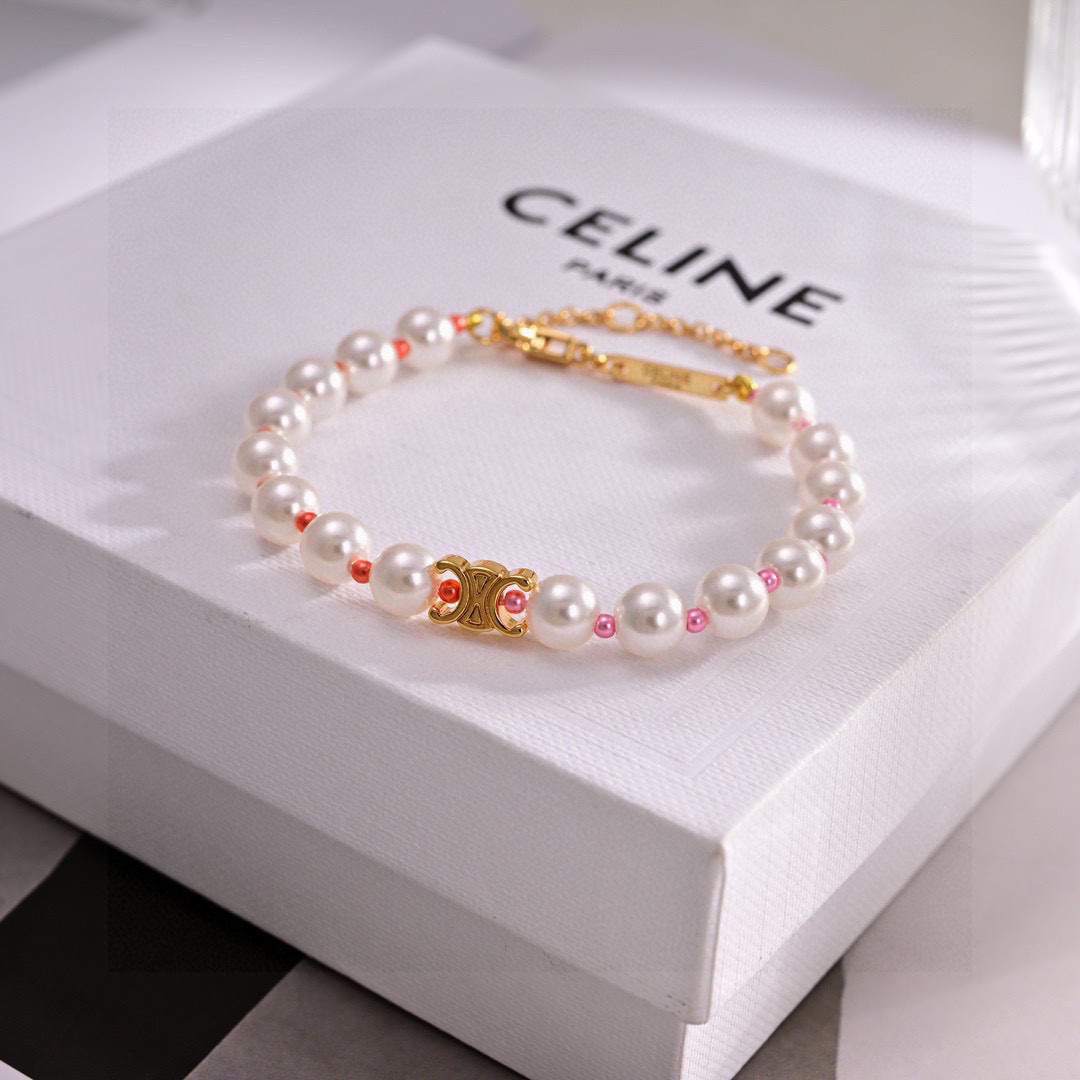 Celine Triomphe Pearl bracelet gold-tone metal white pearls pink and coral accent beads 18cm with 5cm extender chain
