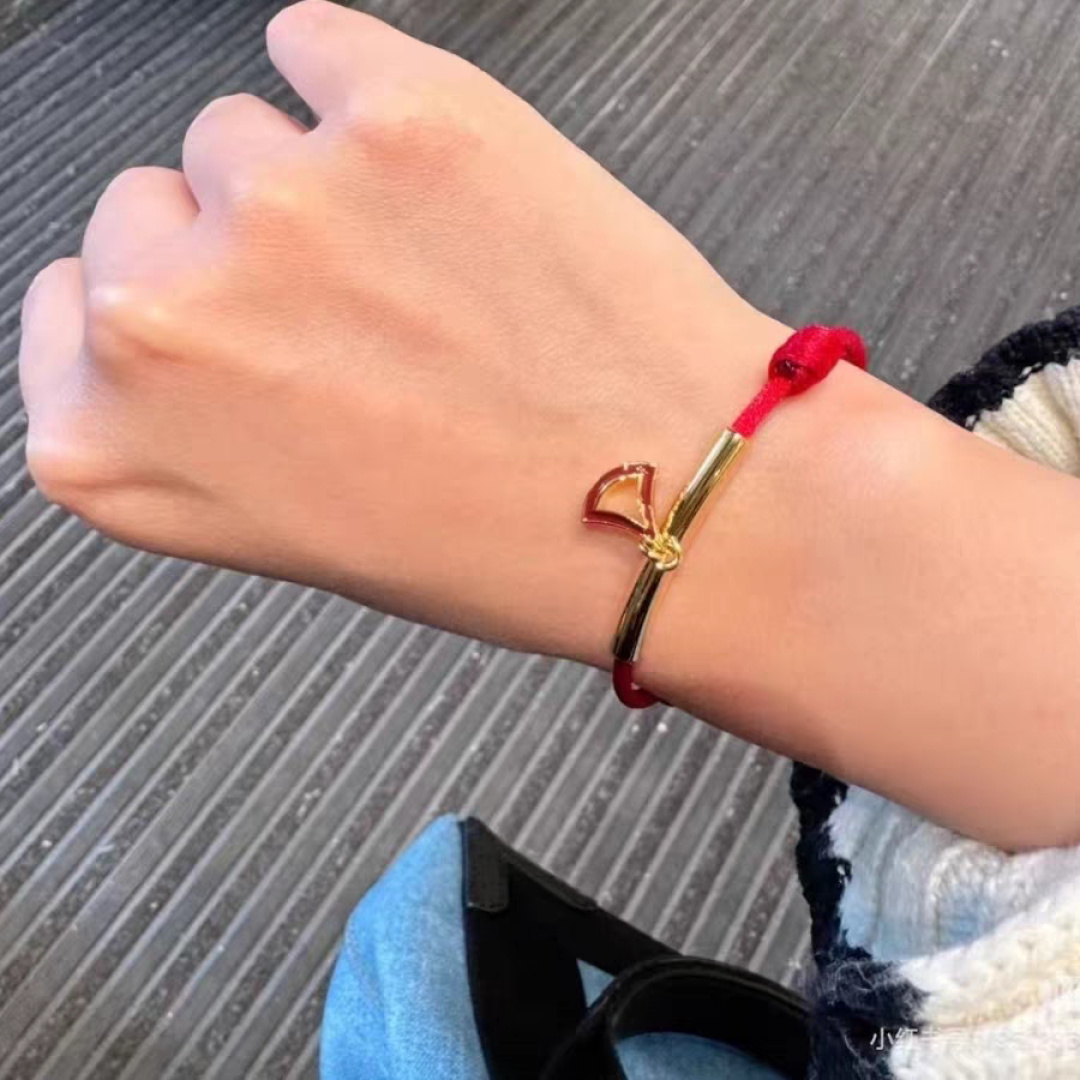 Bvlgari Divas Dream bracelet yellow gold metal red cord red enamel charm adjustable sliding knot fits 15-19cm wrist