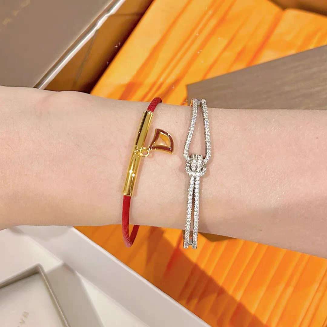 Bvlgari Divas Dream bracelet yellow gold metal red cord red enamel charm adjustable sliding knot fits 15-19cm wrist