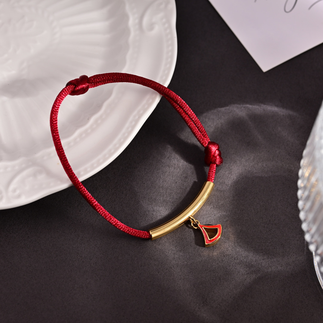 Bvlgari Divas Dream bracelet yellow gold metal red cord red enamel charm adjustable sliding knot fits 15-19cm wrist