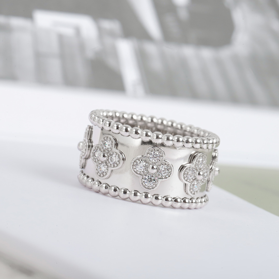 Van Cleef Arpels Perlee ring 18K rose gold with clear diamonds 18K white gold with clear diamonds 54