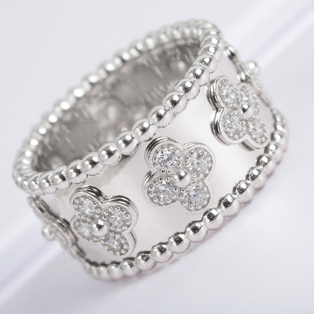 Van Cleef Arpels Perlee ring 18K rose gold with clear diamonds 18K white gold with clear diamonds 54