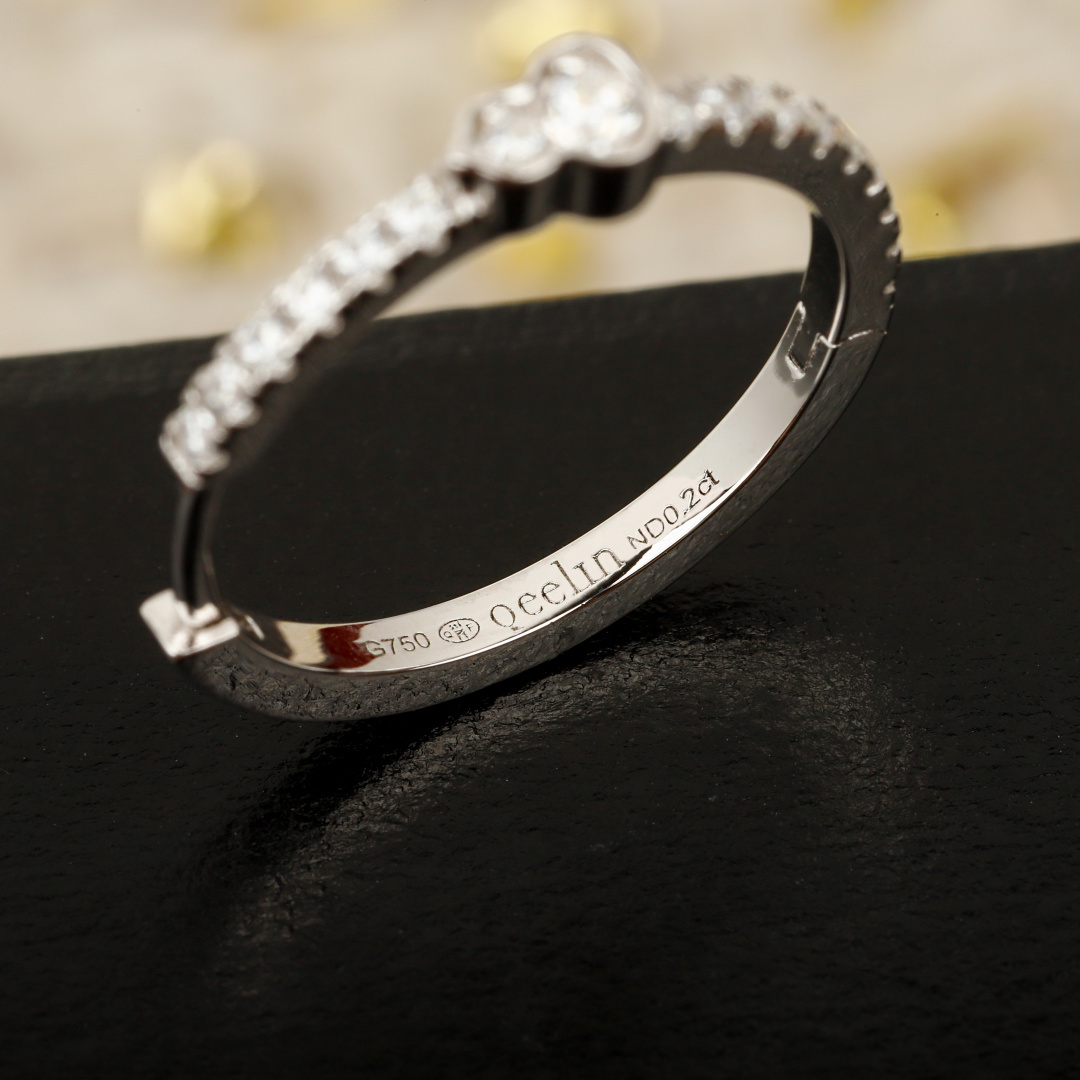 Qeelin Wulu Mini Solitaires earrings 18k white gold with diamonds 18k rose gold with diamonds mini hoop