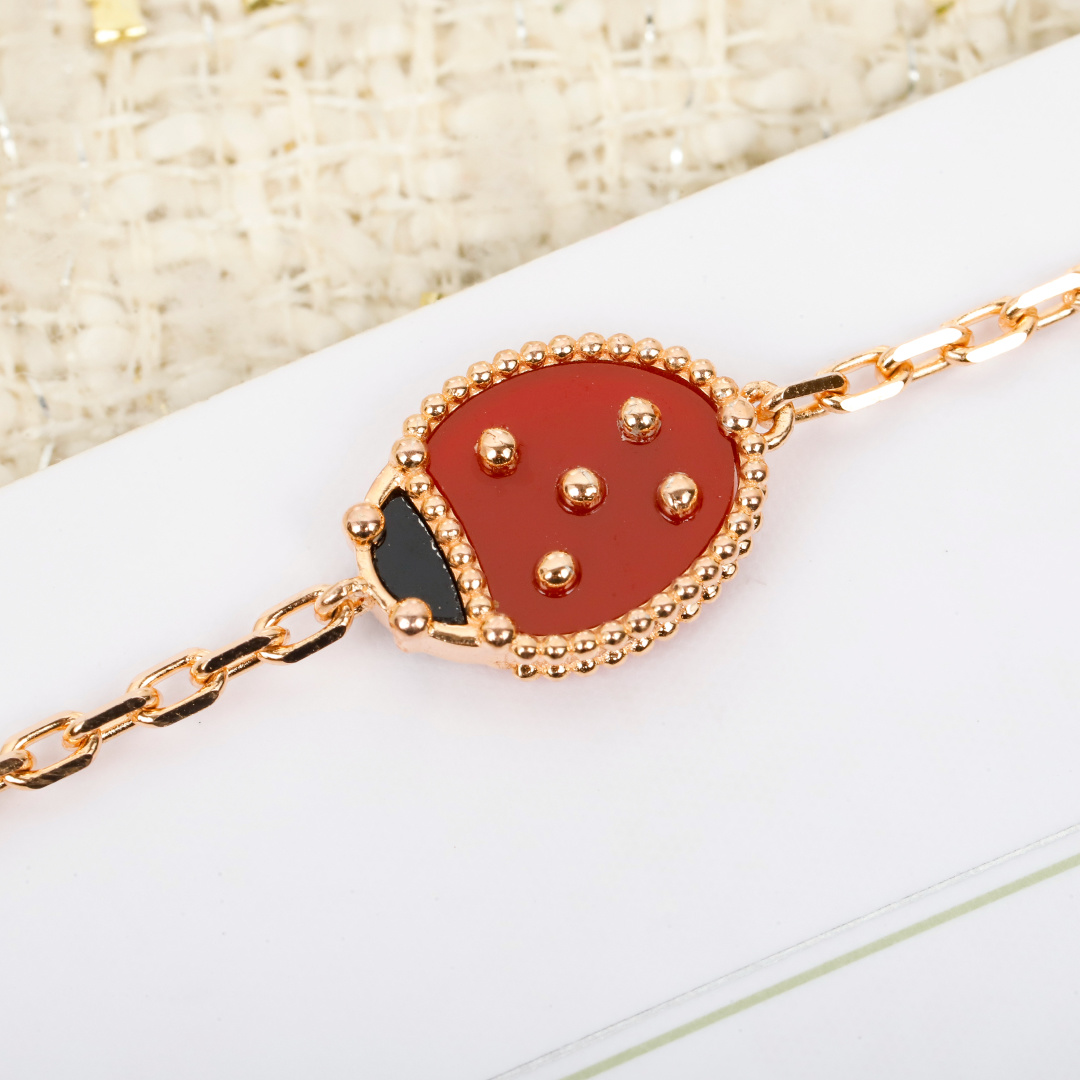 Bracciale Van Cleef Arpels Lucky Spring Oro rosa madreperla bianca corniola rossa onice nero 17 cm