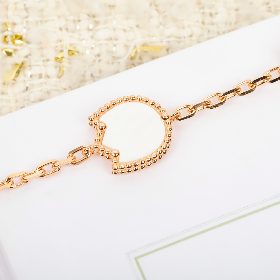 Bracciale Van Cleef Arpels Lucky Spring Oro rosa madreperla bianca corniola rossa onice nero 17 cm