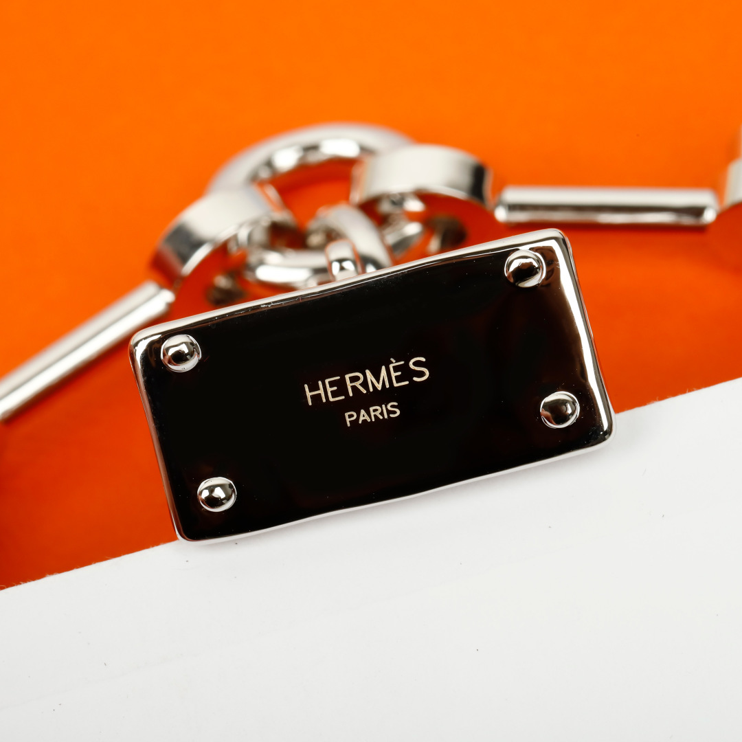Bracciale Hermes Bijou de Birkin N 1 Metallo color argento con accenti in pelle arancione dettaglio smalto rosso ciondoli in argento 17 cm