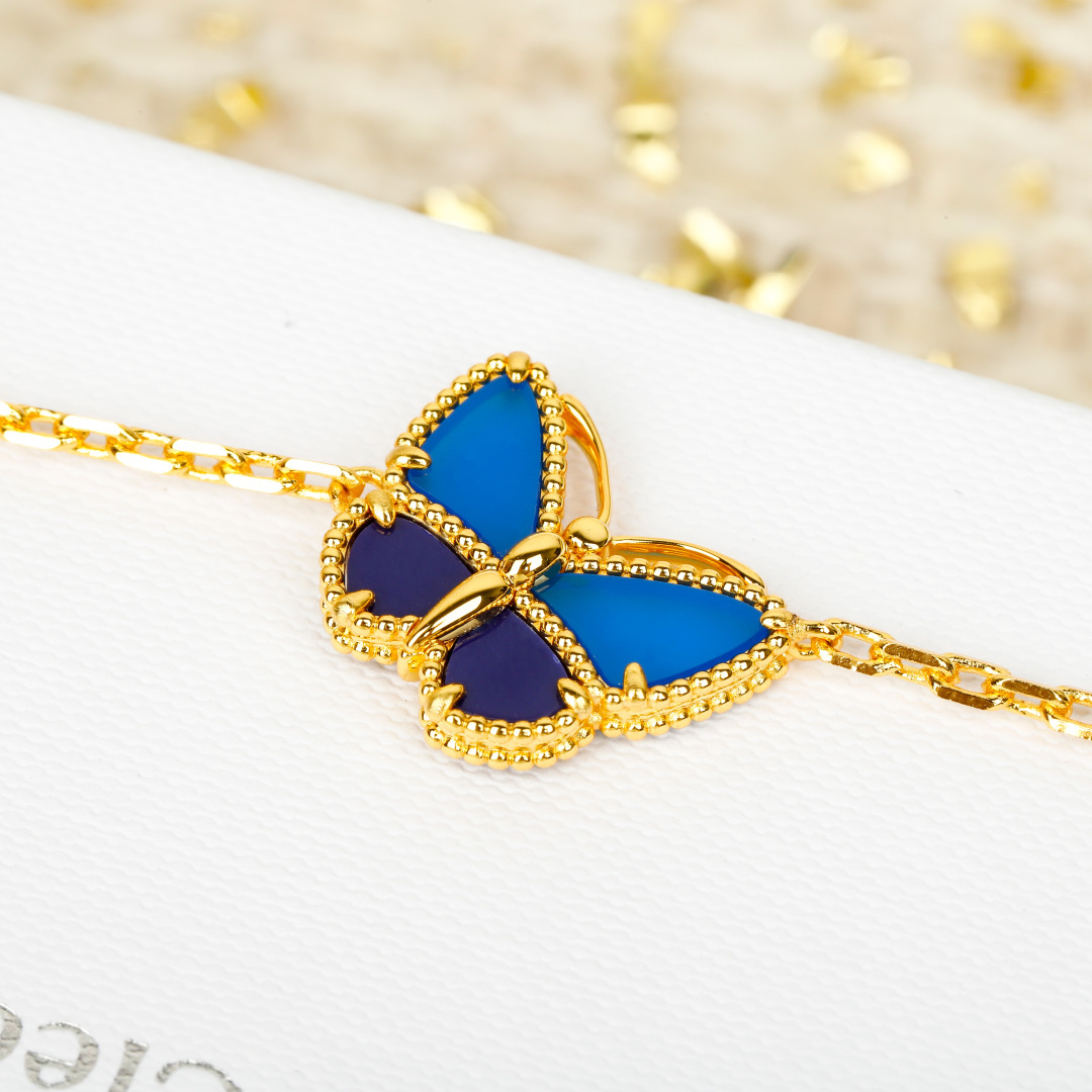 Van Cleef Arpels Lucky Alhambra bracelet 18k yellow gold white mother-of-pearl blue lapis lazuli green malachite 18cm