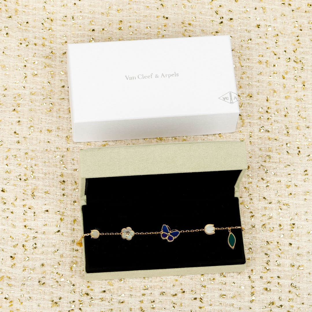 Van Cleef Arpels Lucky Alhambra bracelet 18k yellow gold white mother-of-pearl blue lapis lazuli green malachite 18cm