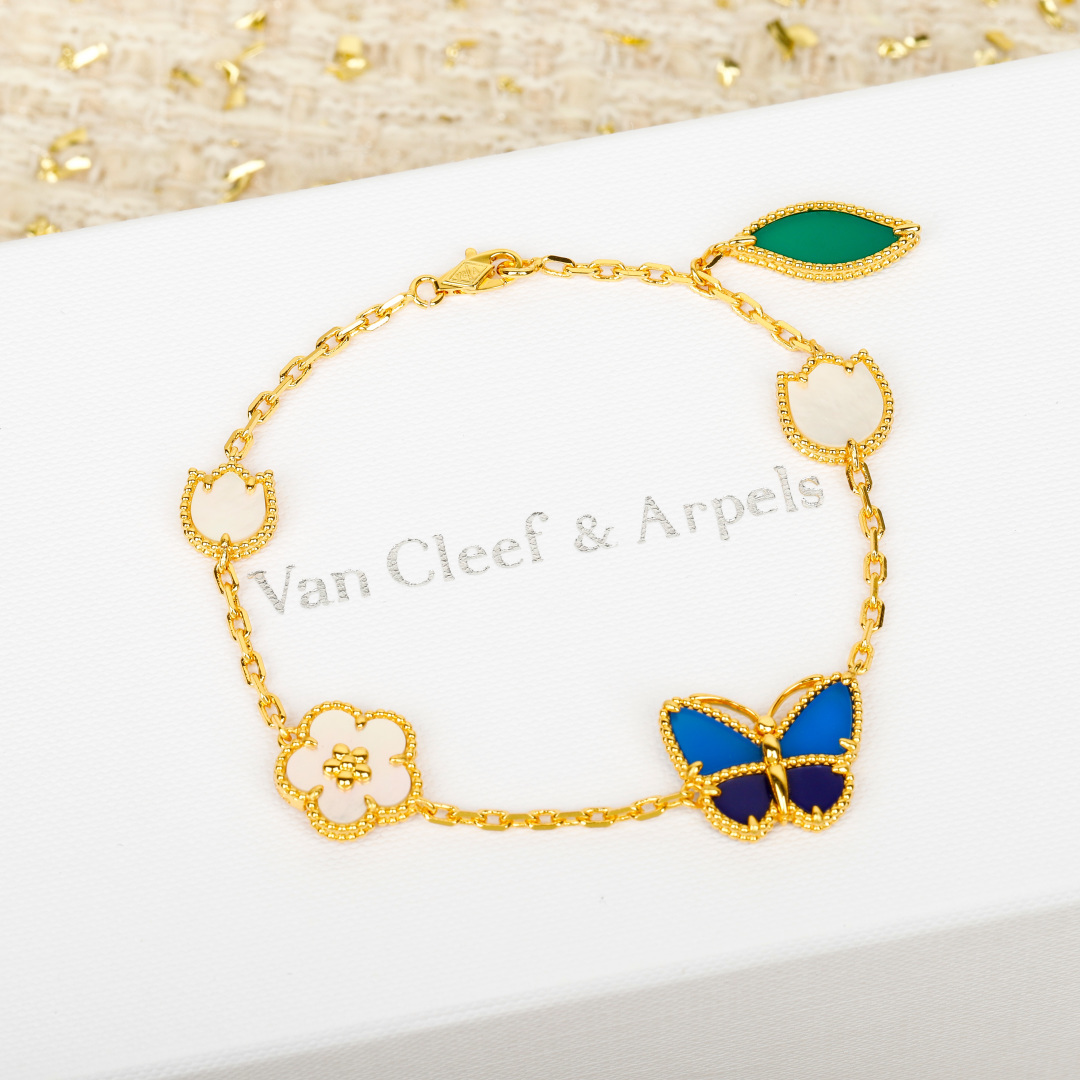 Van Cleef Arpels Lucky Alhambra bracelet 18k yellow gold white mother-of-pearl blue lapis lazuli green malachite 18cm