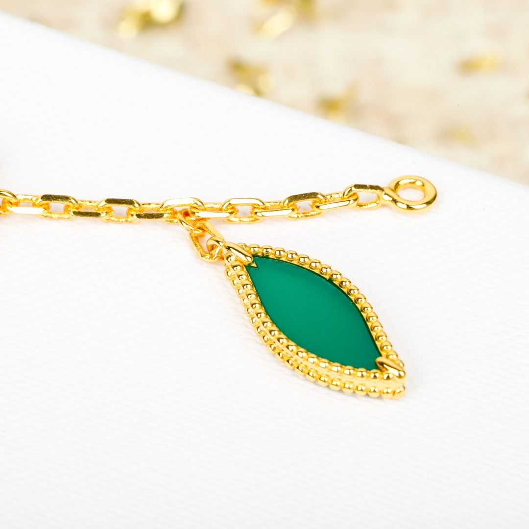 Van Cleef Arpels Lucky Alhambra bracelet 18k yellow gold white mother-of-pearl blue lapis lazuli green malachite 18cm