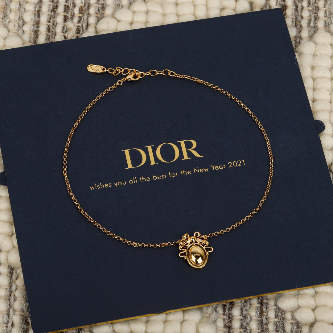 Dior 2021 New Year Bow Oval Pendant bracelet gold-tone metal no accent stones 18cm with 3cm extender