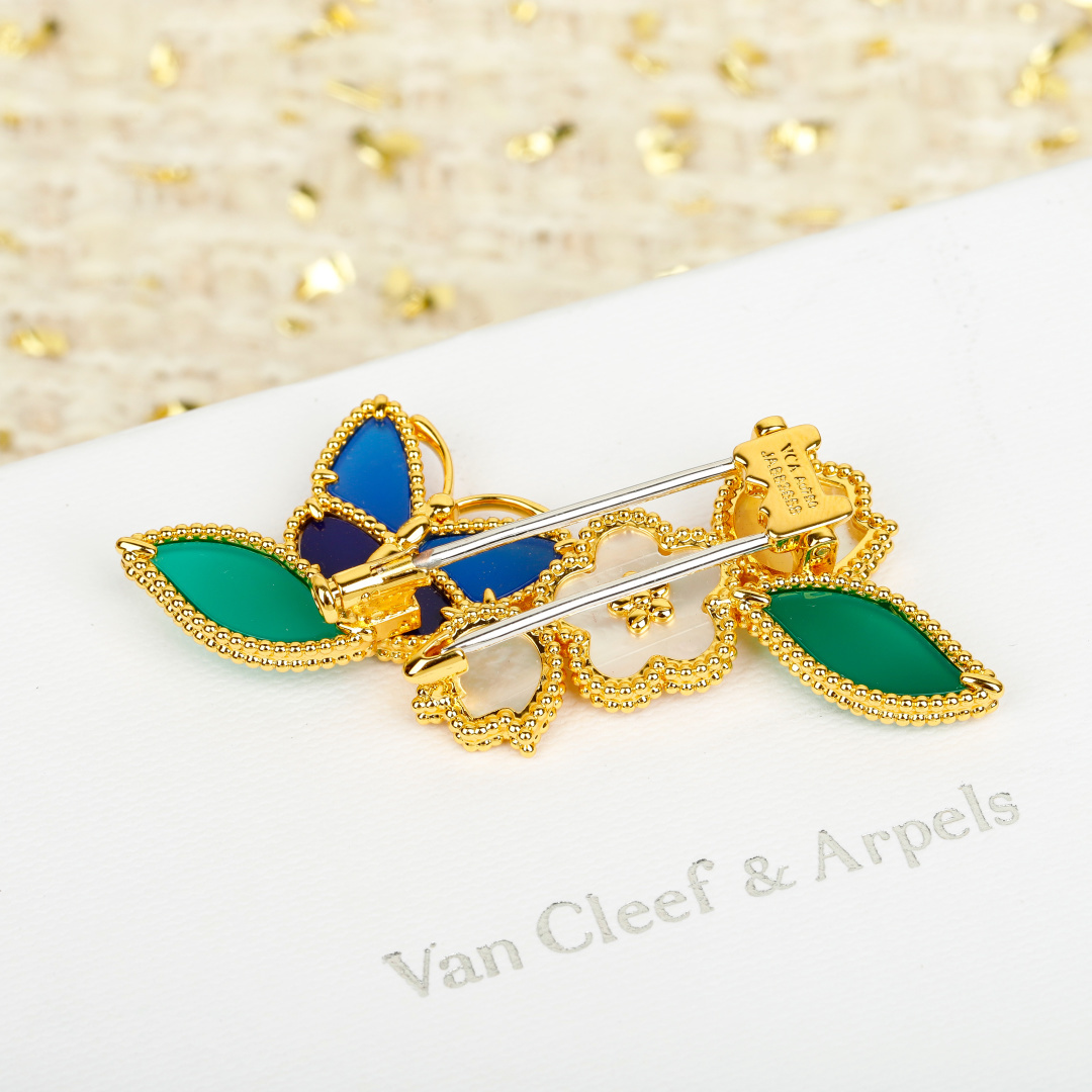 Spilla Van Cleef Arpels Four Seasons Flower Butterfly Spilla Metallo oro giallo madreperla bianca malachite verde lapislazzuli blu e pietre di agata blu larghezza 3,5 cm