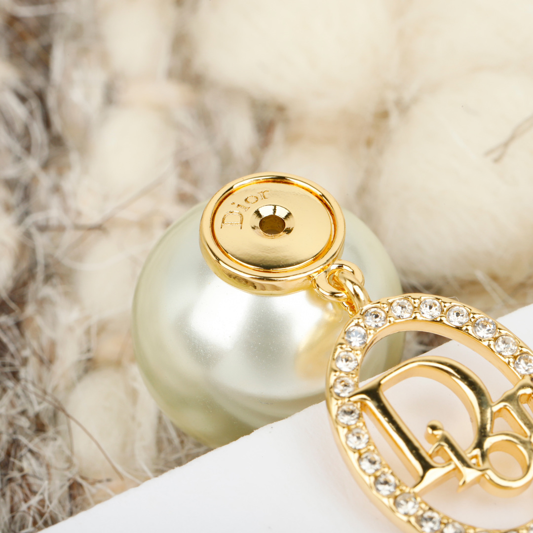 Dior Tribales earrings gold-tone metal white resin pearl clear crystal 1 2cm diameter large pearl 1cm charm drop