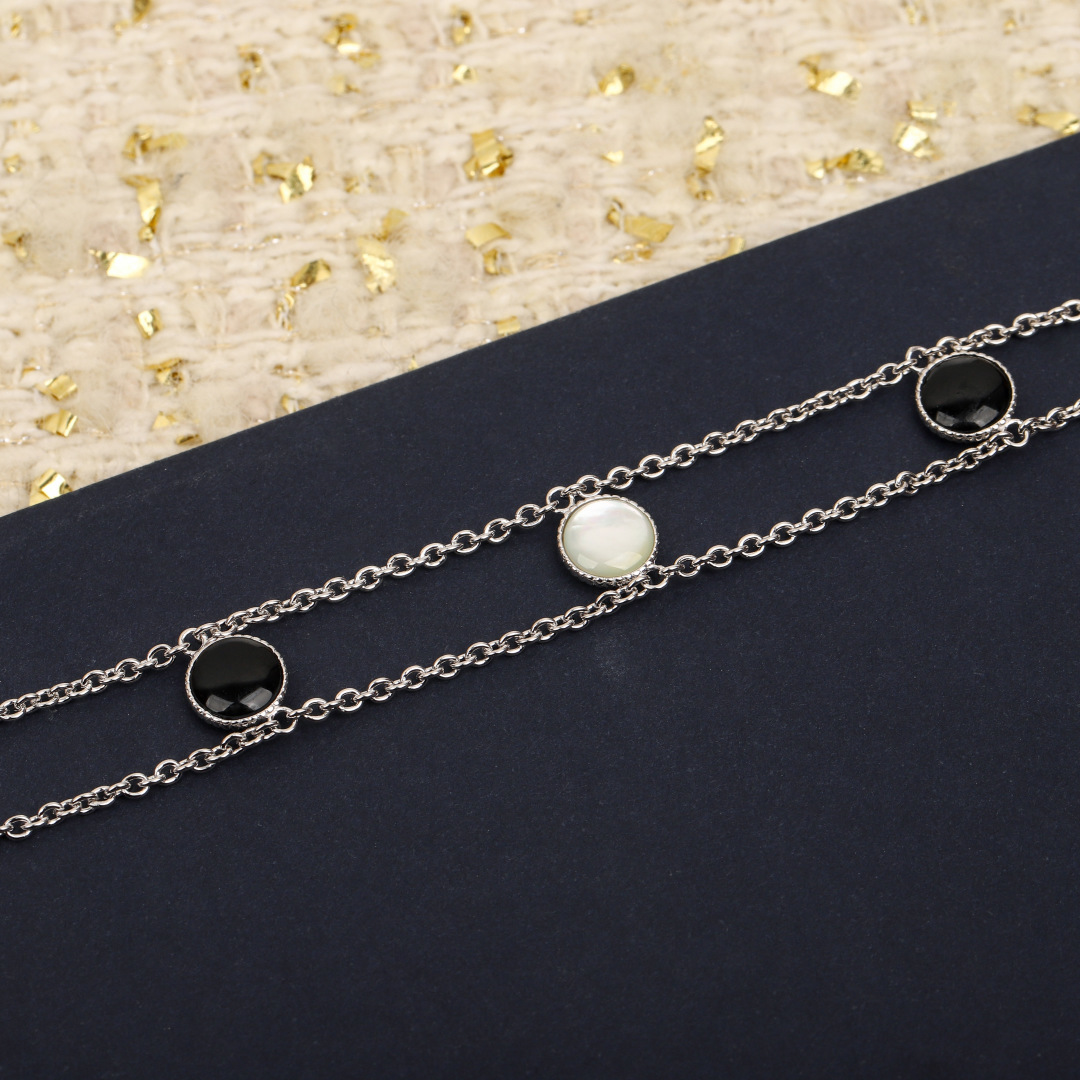 Dior Compass Rose des Vents double-layer long necklace necklace Available in yellow gold rose gold and silver-tone metal set with clear diamonds white mother-of-pearl and black onyx accents 80cm with 5cm extender chain