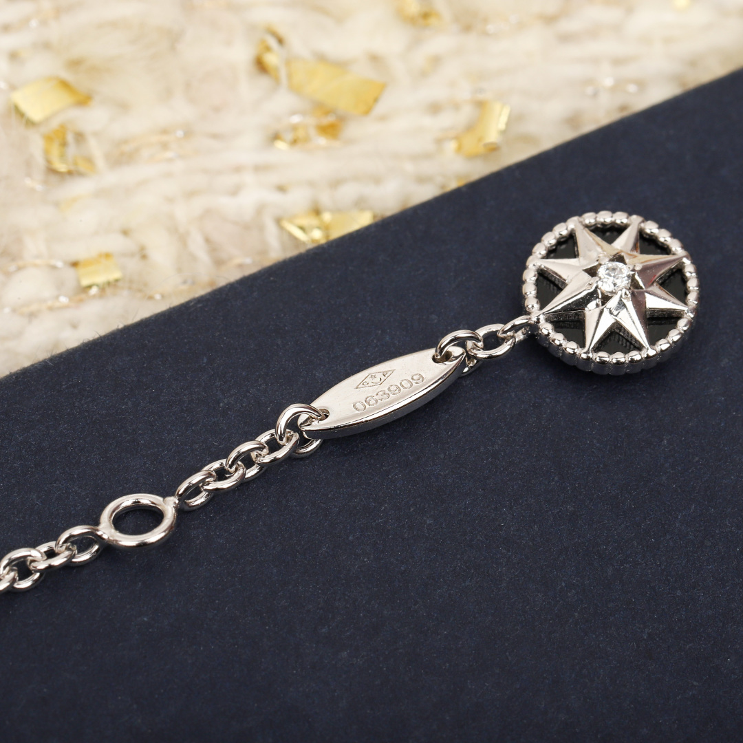 Dior Compass Rose des Vents double-layer long necklace necklace Available in yellow gold rose gold and silver-tone metal set with clear diamonds white mother-of-pearl and black onyx accents 80cm with 5cm extender chain