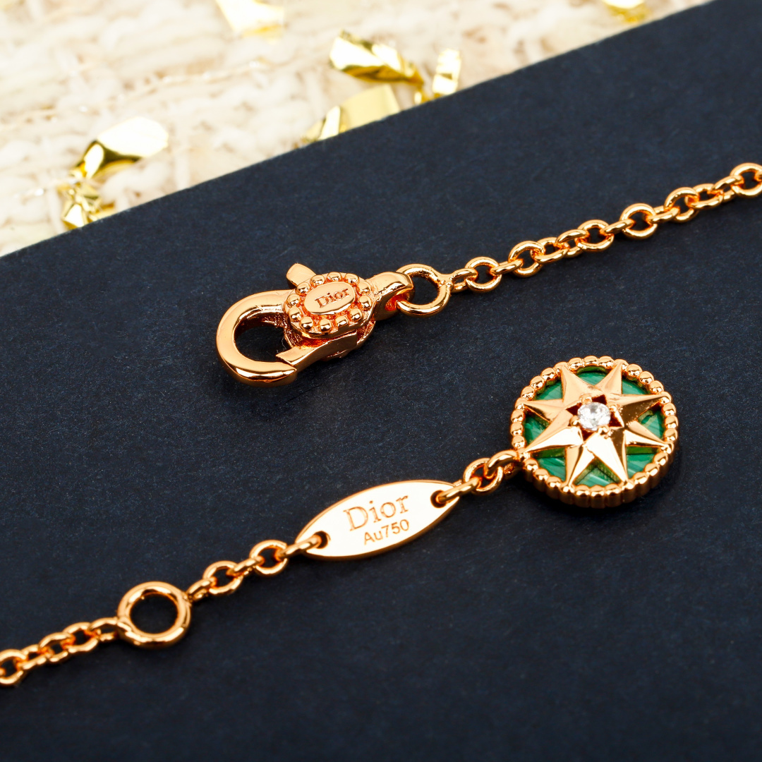 Dior Compass Rose necklace Available in yellow gold silver rose gold metal tones with clear diamond accents and multicolor enamel compass details 42cm with 5cm extender